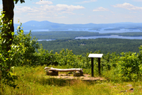 Moultonborough, NH - Bench at Castle in The Clouds trail lookout 13